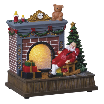 Miasteczko bożonarodzeniowe, scenka świąteczna z Mikołajem przy kominku