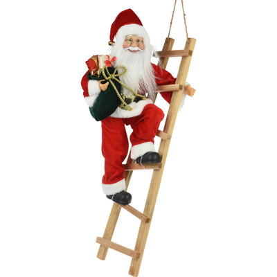 Dekoracja świąteczna Mikołaj na drabinie z prezentem, 65 cm