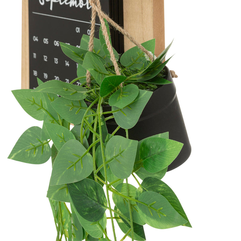 OUTLET Zegar ścienny kalendarzem i sztuczną rośliną, 37 x 60 cm