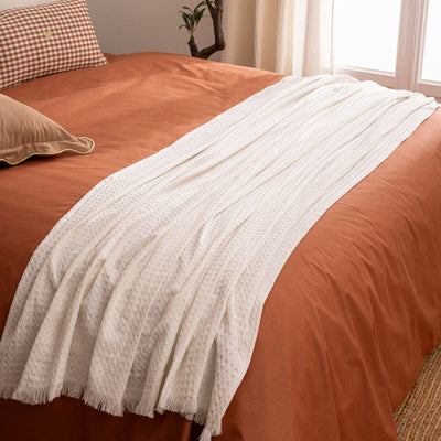 Bawełniana narzuta na łóżko z frędzlami WIDDY, 130 x 180 cm