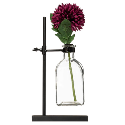 Wazon szklany na stojaku z kwiatem