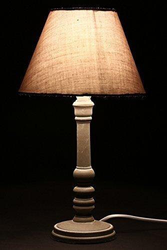 Lampka stojąca z drewnianą podstawką, ciekawy dodatek do oświetlenia pomieszczeń w stylu vintage