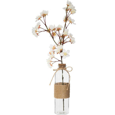 Sztuczne kwiaty w szklanym wazonie, Gałązka wiśni