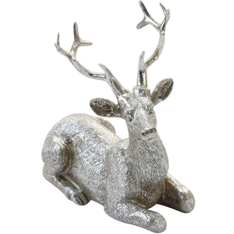Figurka dekoracyjna, motyw leżącego renifera, kolor srebrny, 10 cm